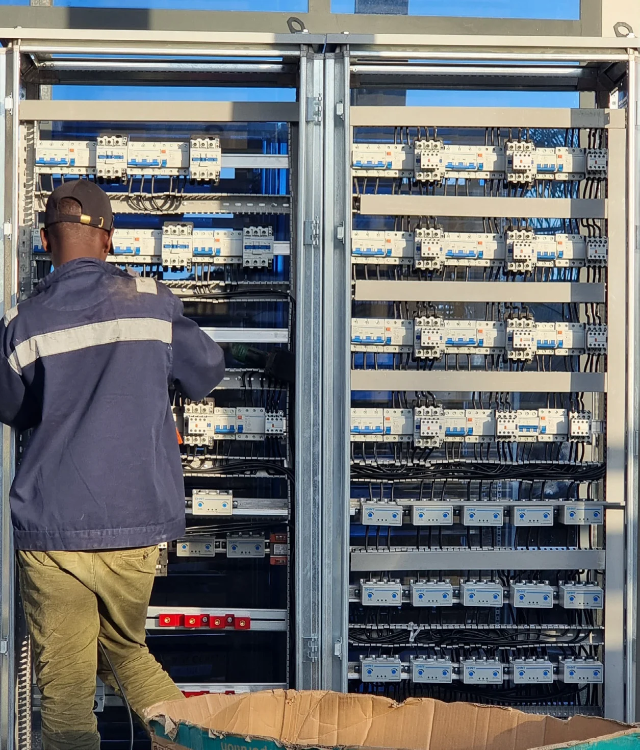 KELM technician wiring a control panel