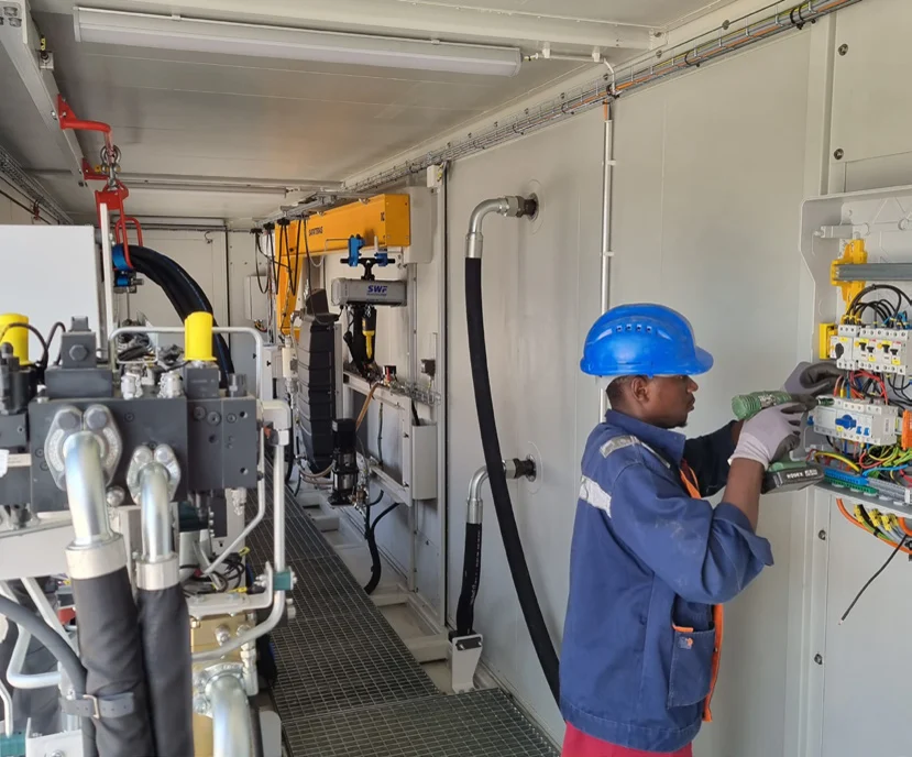 KELM technician maintaining a generator system
