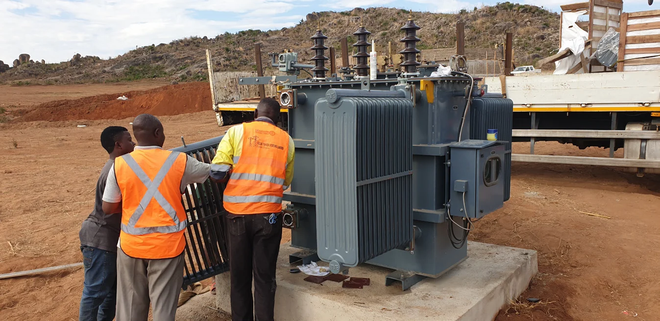 KELM team positioning a power transformer